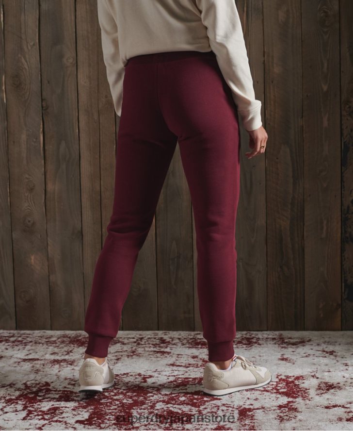 陸上競技用クラシックジョガーパンツ 女性 Superdry 衣類 赤 2J62PZ3945