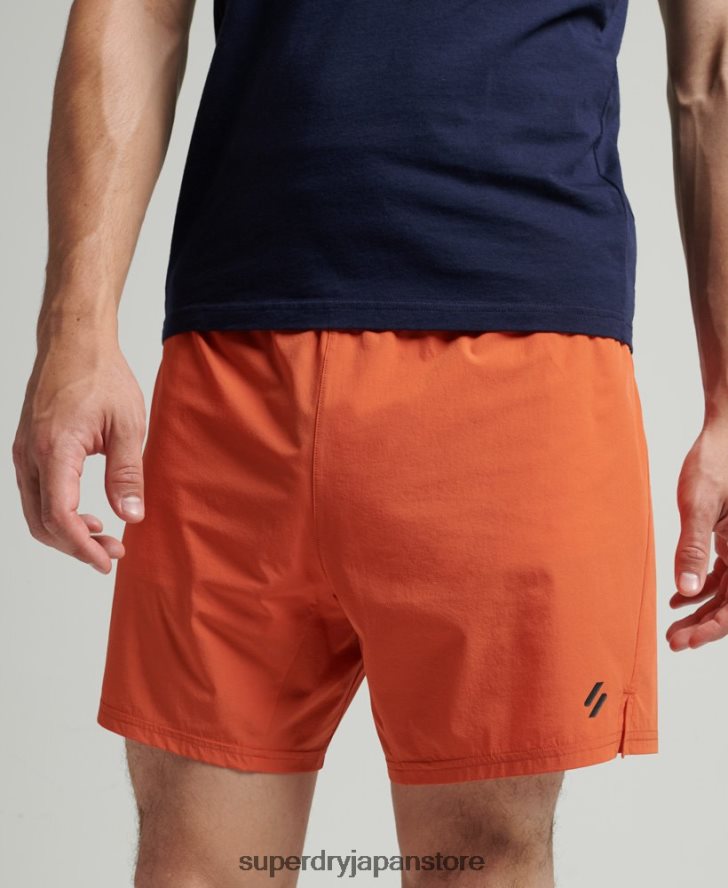 ランニングプレミアムショーツ 男性 Superdry 衣類 オレンジ 2J62PZ5359