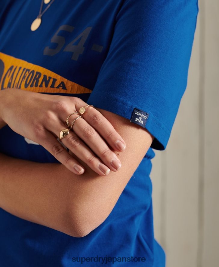 アスレチック アソシエーション カリフォルニア グラフィック T シャツ 女性 Superdry 衣類 青 2J62PZ2825