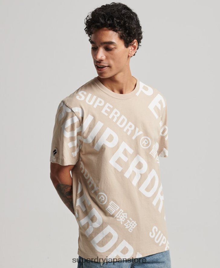 ロゴ全面プリント ルーズ T シャツ 男性 Superdry 衣類 ベージュ 2J62PZ4821
