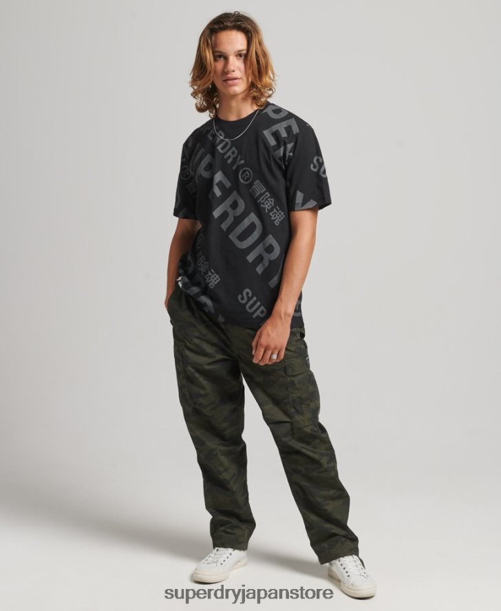 ロゴ全面プリント ルーズ T シャツ 男性 Superdry 衣類 黒 2J62PZ4973